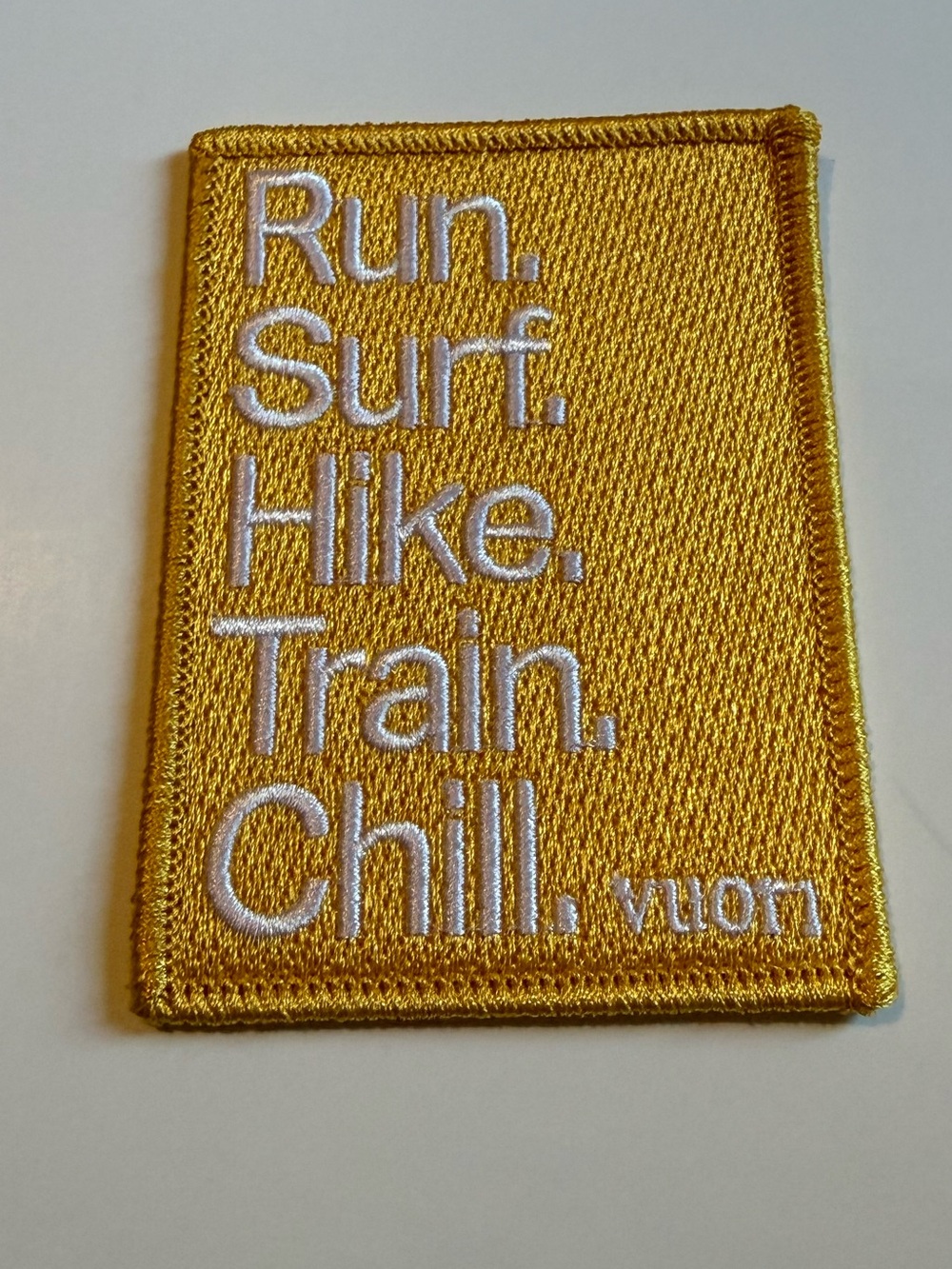 Gold With White Letters Vuori Patch
